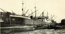 03. Hamburg freighter, being served by barges and lighters. 