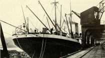 06. Hamburg freighter at a pier, discharging. 